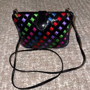 Black Multicolor Woven Crossbody Bag that’s perfect vintage condition.